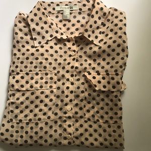 Long blush collared blouse with black polkadots.